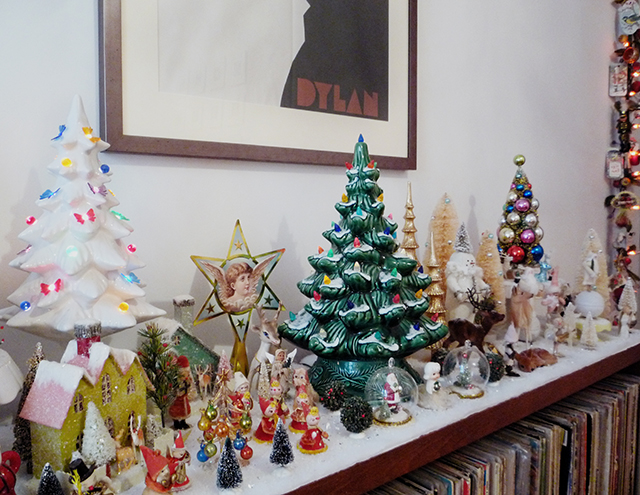 houses perched upon frosty ceramic cake stands to five marching band figurines made of paper and pipe cleaners to a traditional italian christmas tree - Vintage Pipe Cleaner Christmas Decorations houses perched upon frosty ceramic cake stands to five marching band figurines made of paper and pipe cleaners to a traditional italian christmas tree - Vintage Pipe Cleaner Christmas Decorations